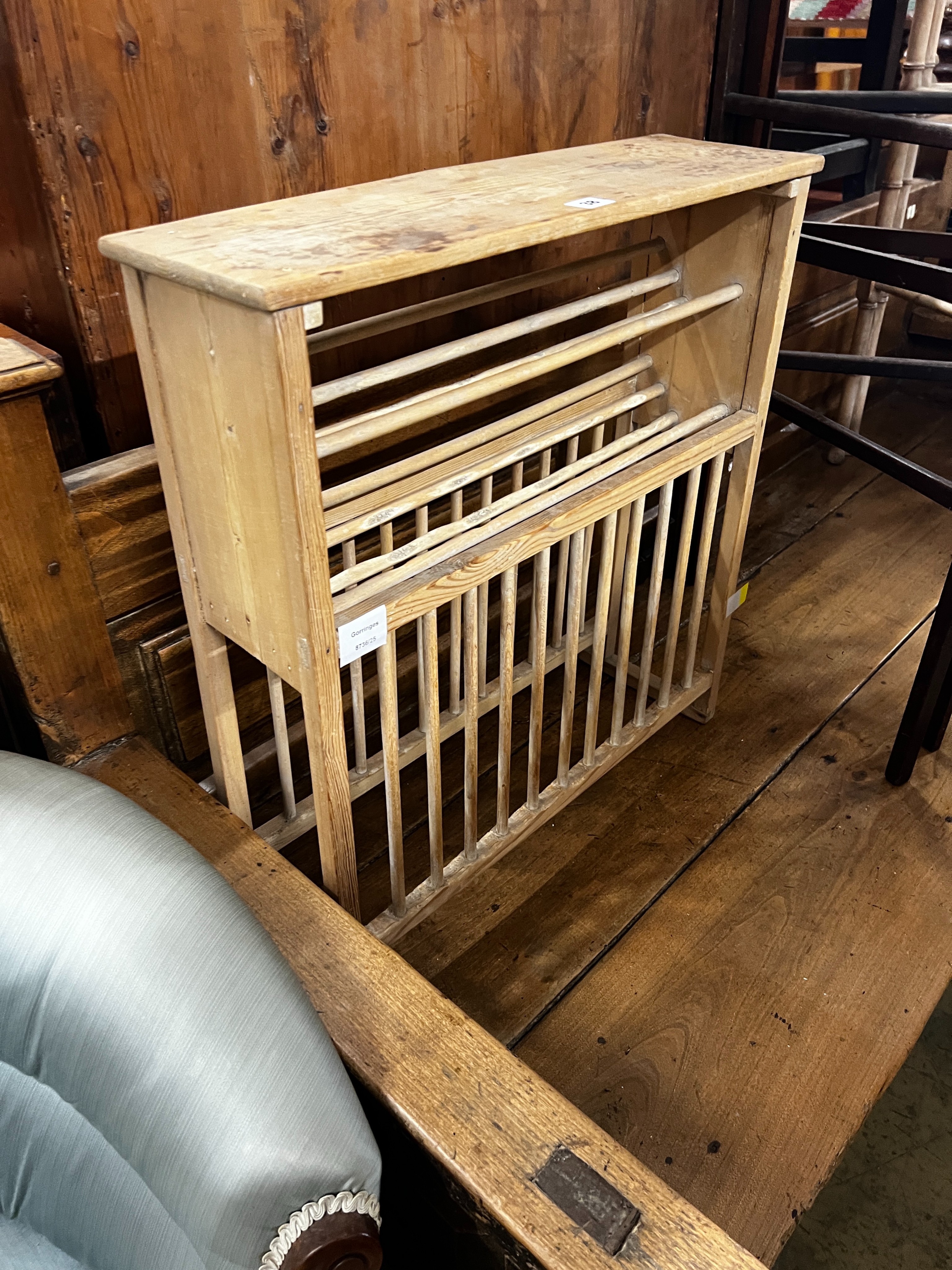 A 19th century provincial pine plate rack, width 57cm, depth 17cm, height 60cm